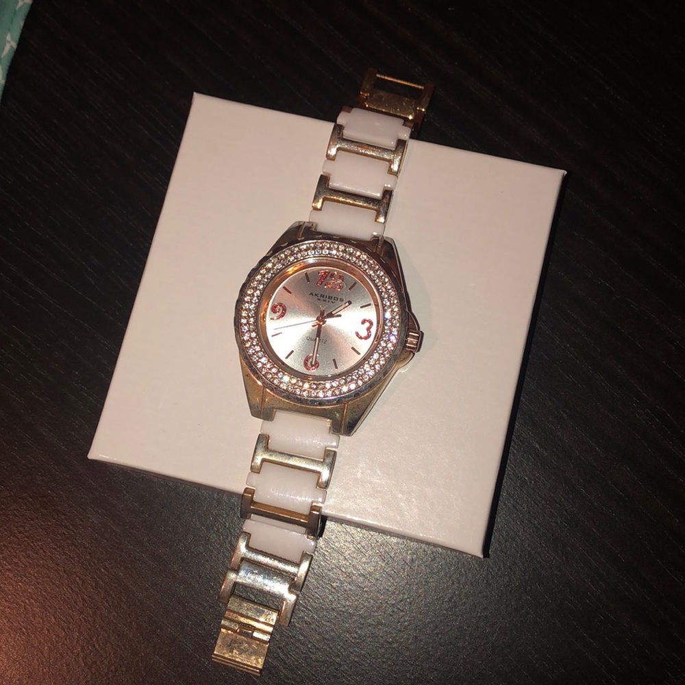 White and gold studded watch